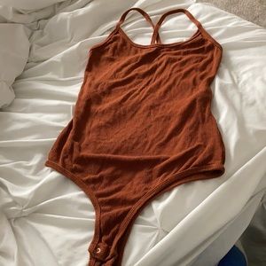 brown bodysuit